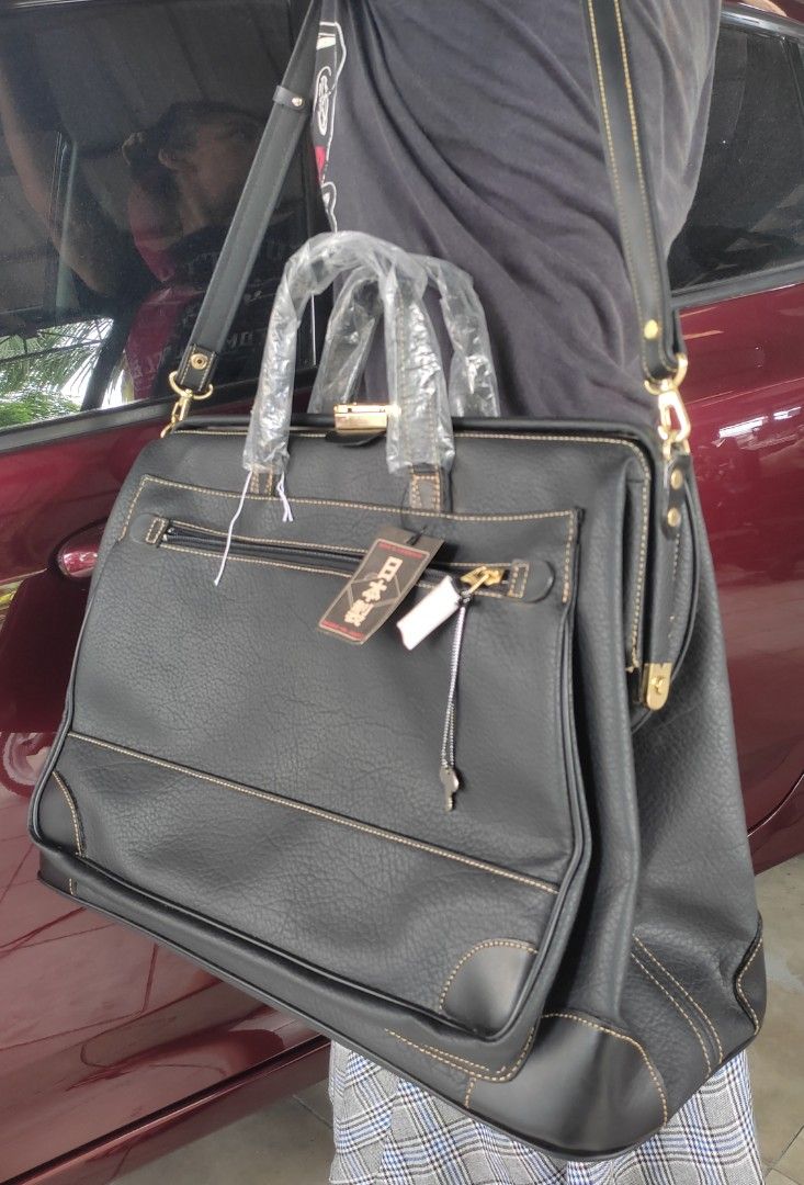 Leather office bag (Category: Tote Bags) located in Cainta. Submitted by allauthenticbymj (Listing ID 1466172800, Image 2). Description: Leather office bag 2way(shoulder to sling) With lock and key Spacious with wide front outer zippered pocket L19"/H13"/W7.5" Price:2,500 ***buyer shoulders sf LOCATION: CAINTA Courier choices and MOP Gogo express (cod option) LBC (pay sf first-- cop for the item's amount) J&t (gcash payment) Lalamove for same day