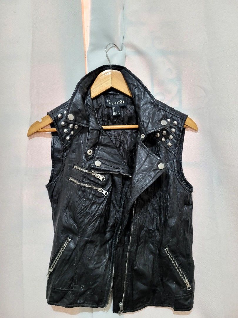 Leather Vest - Forever 21 (Category: Luxury Apparel) located in Batangas. Submitted by dramaticcloset (Listing ID 1466221770, Image 1). Description: Vintage Forever 21 Studded Leather Vest Size L on tag Needs light cleaning only!.
