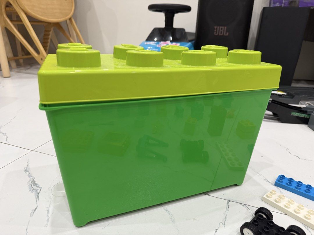 LEGO DUPLO Extra Ideas Brick Box 10914 (85pcs) (Category: Lego & Building Sets) located in Manila. Submitted by paula021690 (Listing ID 1466158607, Image 2). Description: Inclusion: - Storage box - duplo 81pcs (missing 4pcs, see 4th pic for reference) - Freebies duplo LEGO DUPLO Extra Ideas set in green storage box with lid. Includes colorful bricks, vehicle bases, figures, flowers, and instruction booklet. Few pieces missing marked on manual, pl