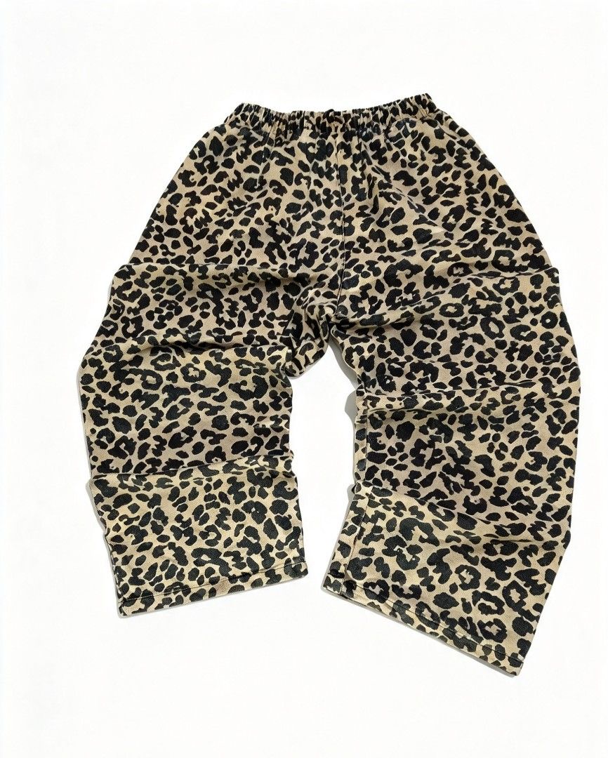 Leopard Print Drawstring Pants (Category: Jeans) located in Manila. Submitted by nisayy13 (Listing ID 1466242963, Image 2). Description: - Trendy leopard print casual pants - Comfortable elastic waistband with a black drawstring - Relaxed fit with stylish wide legs - Made from soft, lightweight patterned fabric - Versatile piece, easy to style with plain tees or crop tops for everyday wear.