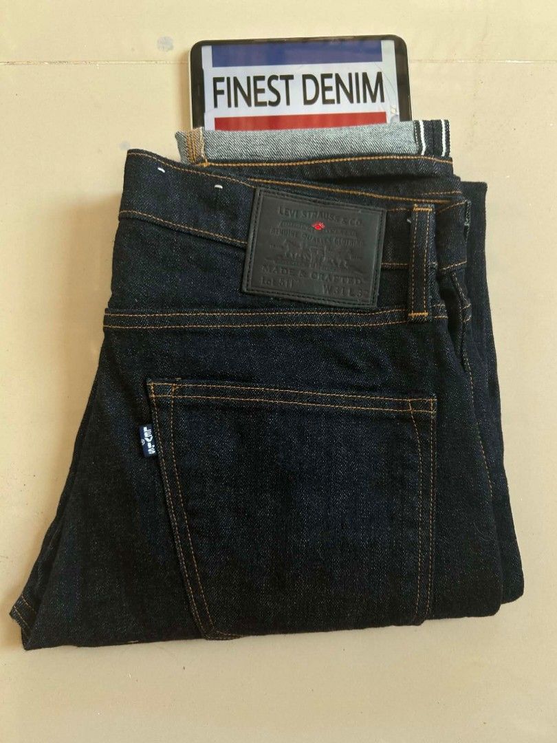 Levi's Made & Crafted Lot 511 (Category: Jeans) located in Manila. Submitted by finestdenimmnl (Listing ID 1466245944, Image 1). Description: - Brand: Levi's Made & Crafted - Model/Fit: Lot 512 Slim Taper - Size: W32 - Wash: Dark indigo with contrast orange stitching - Details: Japanese selvedge, red sun tab, leather back patch, traditional 5-pocket setup - Condition: Pristine, well-kept denim.