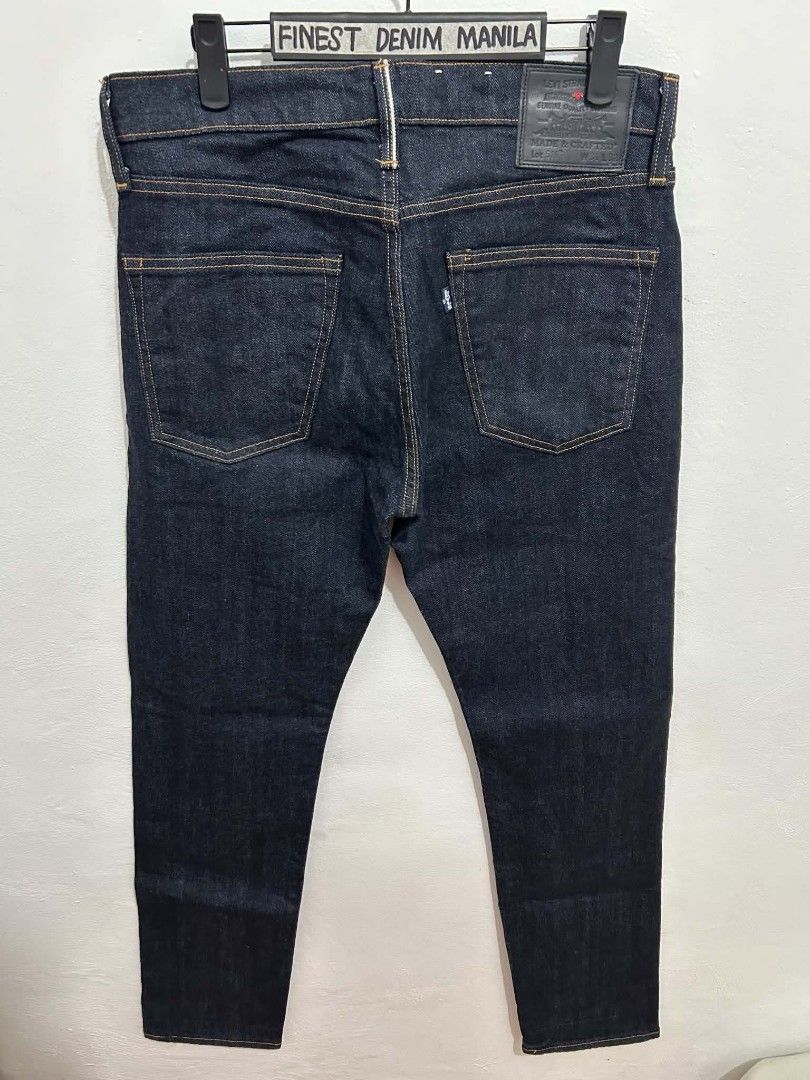 Levi's Made & Crafted Lot 511 (Category: Jeans) located in Manila. Submitted by finestdenimmnl (Listing ID 1466245944, Image 2). Description: - Brand: Levi's Made & Crafted - Model/Fit: Lot 512 Slim Taper - Size: W32 - Wash: Dark indigo with contrast orange stitching - Details: Japanese selvedge, red sun tab, leather back patch, traditional 5-pocket setup - Condition: Pristine, well-kept denim.