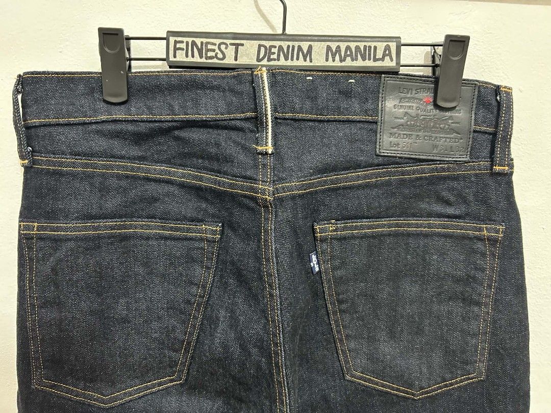 Levi's Made & Crafted Lot 511 (Category: Jeans) located in Manila. Submitted by finestdenimmnl (Listing ID 1466245944, Image 3). Description: - Brand: Levi's Made & Crafted - Model/Fit: Lot 512 Slim Taper - Size: W32 - Wash: Dark indigo with contrast orange stitching - Details: Japanese selvedge, red sun tab, leather back patch, traditional 5-pocket setup - Condition: Pristine, well-kept denim.