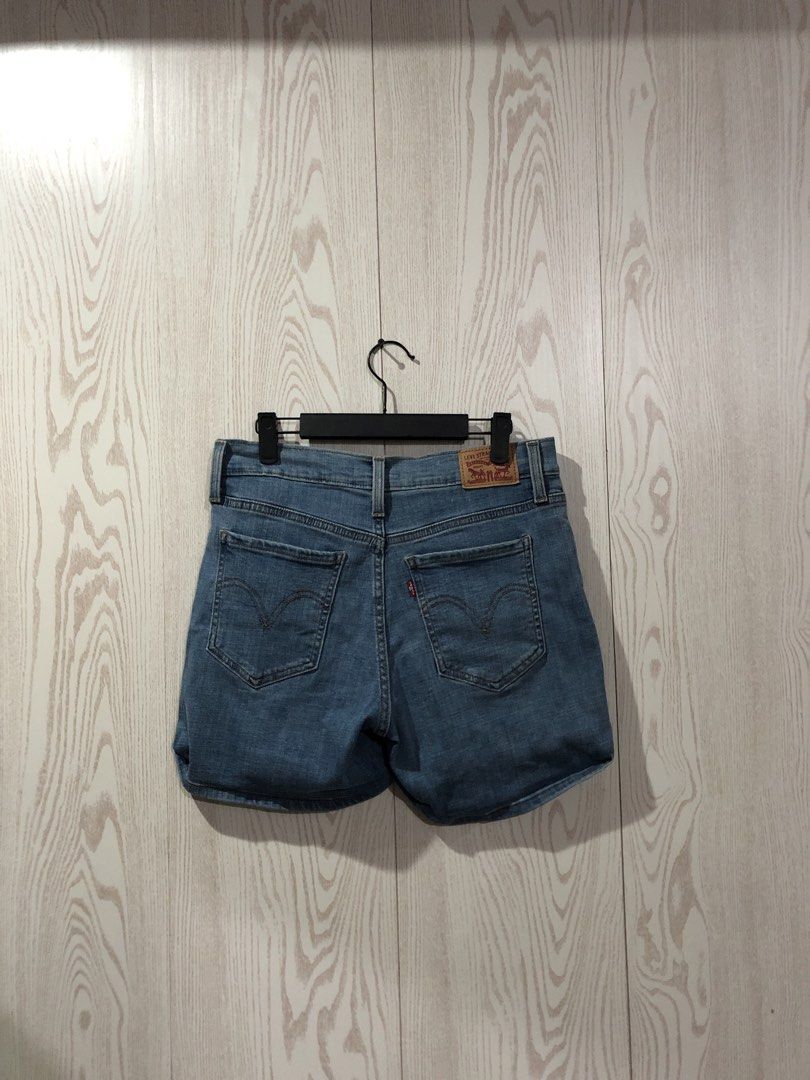 Levi's Mid Length Denim Shorts Size 29 (Category: Shorts) located in Magsaysay. Submitted by ryns_thrifting (Listing ID 1466256610, Image 2). Description: - Brand: Levi's - Size: 29 (tag inside) - Wash: Classic mid blue - Design: Five-pocket style with button closure and zip fly - Details: Trendy rolled cuffs, back leather patch, and iconic red tab - Condition: Excellent, ready to wear.