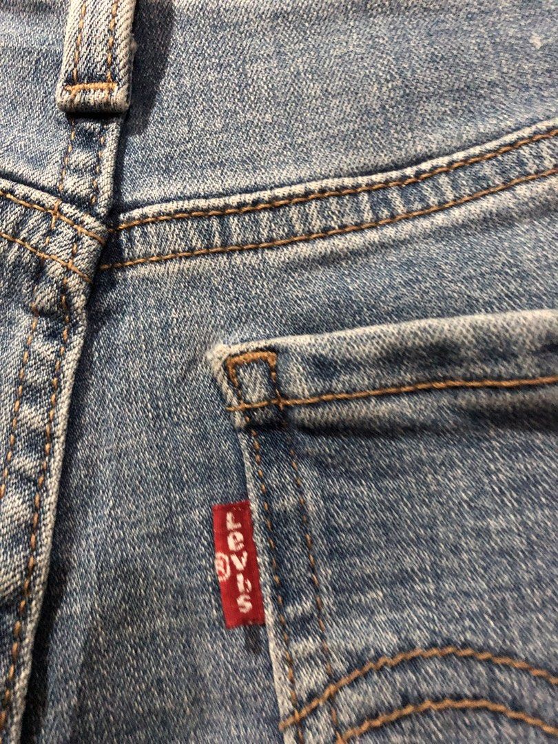 Levi's Mid Length Denim Shorts Size 29 (Category: Shorts) located in Magsaysay. Submitted by ryns_thrifting (Listing ID 1466256610, Image 3). Description: - Brand: Levi's - Size: 29 (tag inside) - Wash: Classic mid blue - Design: Five-pocket style with button closure and zip fly - Details: Trendy rolled cuffs, back leather patch, and iconic red tab - Condition: Excellent, ready to wear.