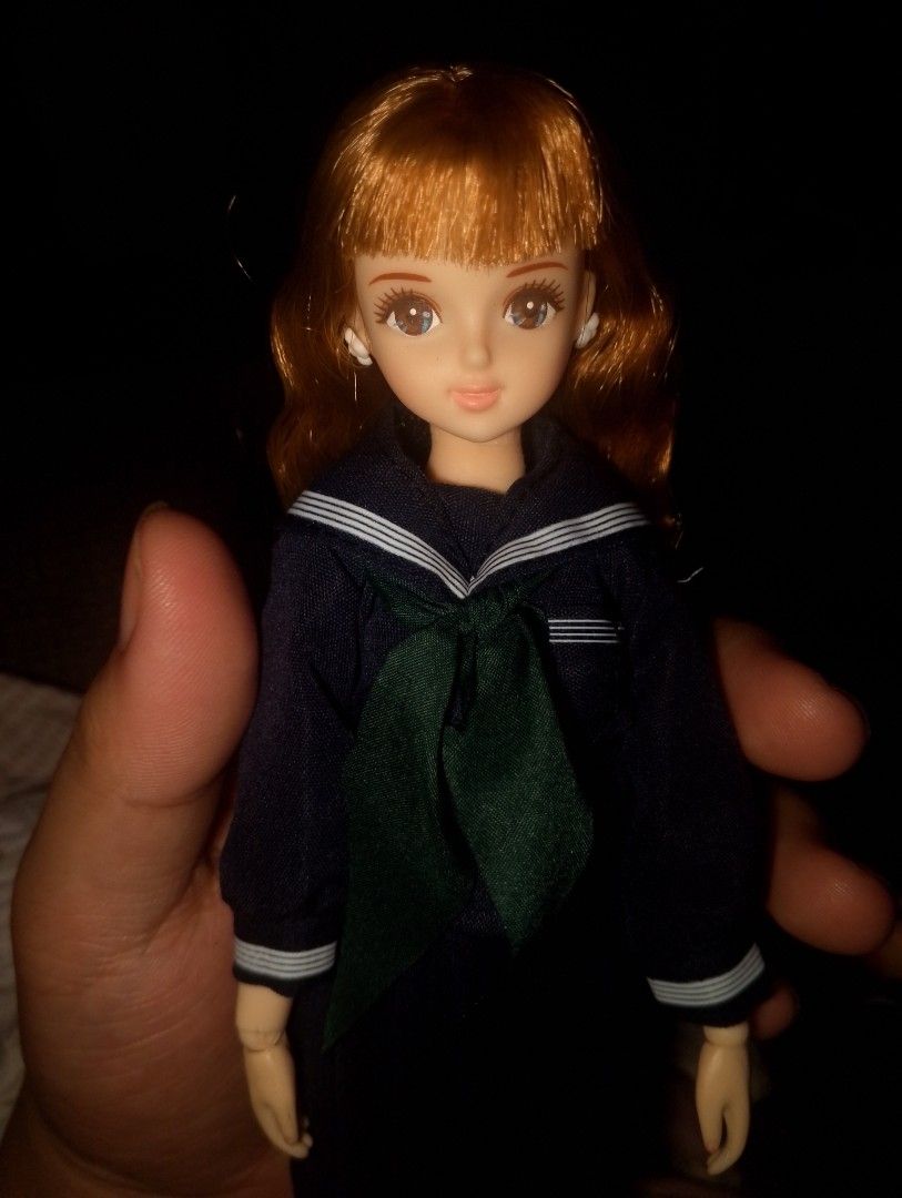 Licca Castle Sayaka - Fun Doll (Category: Plushies & Soft Toys) located in Manila. Submitted by sweetkaminade (Listing ID 1466262155, Image 1). Description: - Adorable collectible doll with lovely ginger hair in gentle waves and bangs - Dressed in a classic navy sailor uniform with white stripes and a dark green necktie - Features articulated arms and hands for easy posing - Accessorized with cute white button earrings - Clean fabric clothing and