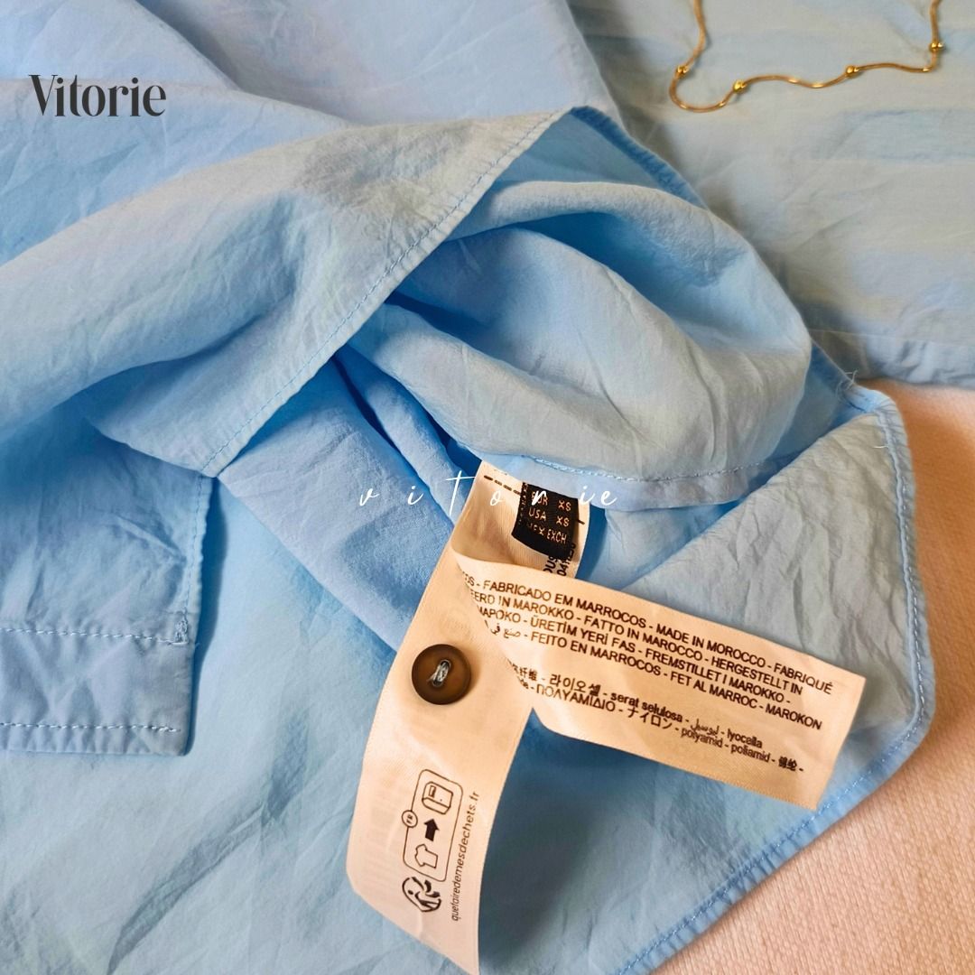 Light Blue Button Up Shirt Oversized Loose Fit (Category: Shirts) located in Cabuyao City. Submitted by vitorieclothing_lifestyle (Listing ID 1466257053, Image 2). Description: - Color: Light blue - Fit: Oversized (Comfortably fits sizes L to XL) - Style: Classic collar, drop shoulder, front button-down - Material/Vibe: Comfy, easy to style, great for everyday casual wear - Measurements: Shoulder 16", Bust 48", Length 21", Sleeves 23", Arm Circum