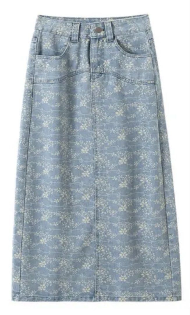 Light Blue Floral Denim Maxi Skirt (Category: Skirts) located in Manila. Submitted by shayne2 (Listing ID 1466292842, Image 1). Description: Fits 31-32. Maxi - Style: Light blue denim maxi skirt with a cute all-over floral print - high-rise waist with belt loops - Details: Front button closure and standard functional pockets - Versatility: Perfect for everyday wear, easily paired with basic tees or knit tops - Condition: Excellent / Like new - Sh