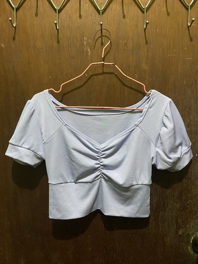 Light Purple Ribbed Crop Top (Category: Blouses) located in Borongan. Submitted by km_obsessed (Listing ID 1466299700, Image 1). Description: - Color: Light Purple - Material: Comfortable ribbed fabric - Design: Sweetheart neckline with center ruching - Sleeves: Short puff sleeves with banded cuffs - Fit: Fitted waistband and cropped length - Style: Casual everyday wear - Mode of Payment: GCash - Shipping: Fast shipping via J&T Express.