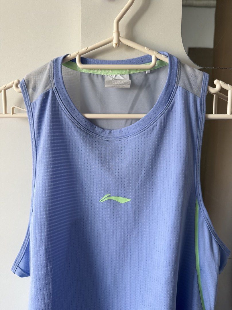 Li-Ning Running - Size S (Category: Activewear) located in Mandaluyong City. Submitted by rreynax (Listing ID 1466199393, Image 2). Description: - Brand: Li-Ning - Item: Athletic Running Tank Top - Color: Light blue with lime green logo and trim - Size: S - Technology: AT DRY moisture-wicking fabric - Design: Breathable mesh panels at the shoulders - Ideal for: Running, gym sessions, and sports - Condition: Clean and well-maintained.