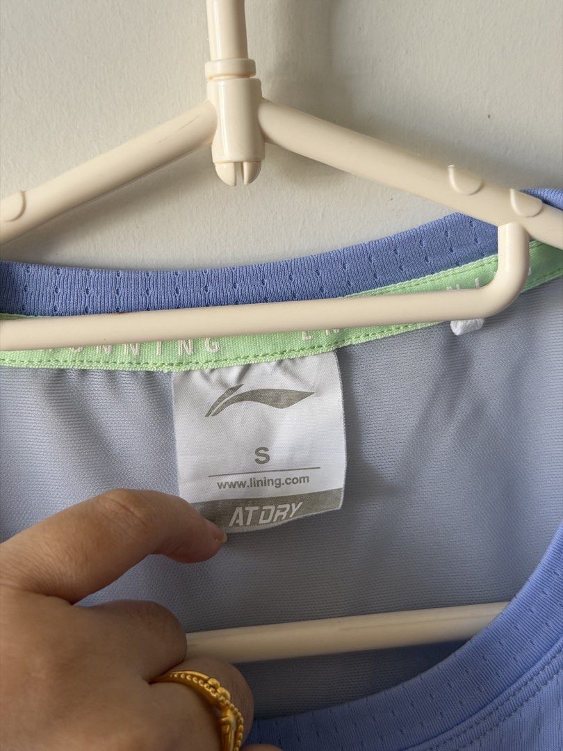 Li-Ning Running - Size S (Category: Activewear) located in Mandaluyong City. Submitted by rreynax (Listing ID 1466199393, Image 3). Description: - Brand: Li-Ning - Item: Athletic Running Tank Top - Color: Light blue with lime green logo and trim - Size: S - Technology: AT DRY moisture-wicking fabric - Design: Breathable mesh panels at the shoulders - Ideal for: Running, gym sessions, and sports - Condition: Clean and well-maintained.