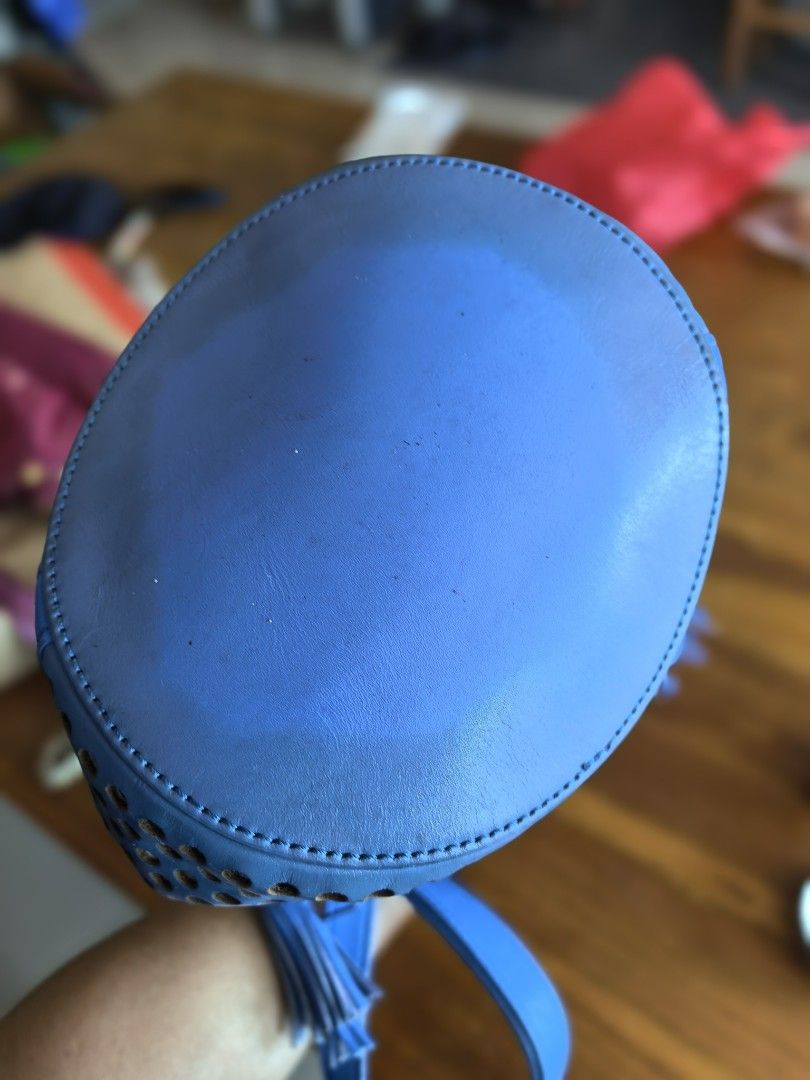Loeffler Randall blue perforated leather bucket bag (Category: Cross-body Bags) located in Cagayan de Oro. Submitted by tommygurl1218 (Listing ID 1466220187, Image 3). Description: - Brand/Style: Loeffler Randall leather bucket bag in a bright blue shade - Design: Laser-cut perforation details on the lower half with a drawstring closure - Accents: Matching side tassel and silver-tone hardware rings on the shoulder strap - Condition: Base shows mi