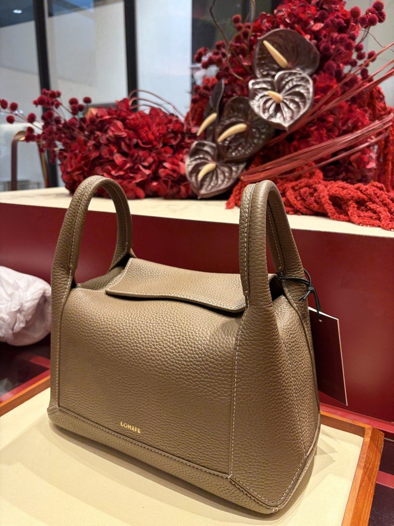 Lomafe Fien in Taupe (Regular size) (Category: Luxury Bags & Wallets) located in Quezon City. Submitted by _jennkyle10 (Listing ID 1466232513, Image 1). Description: Used a few times only Bought in store at reg price (14,800) With dustbag and box Can do meetup near SM North/Commonwealth .