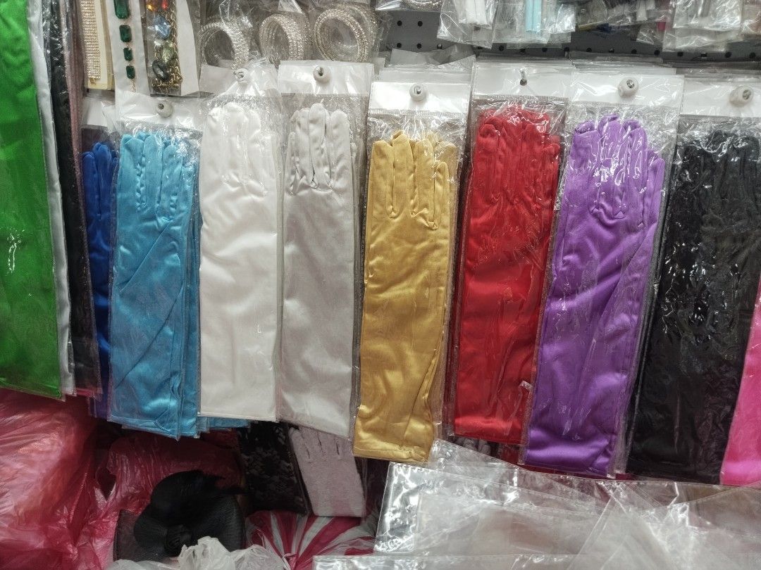 Long Satin and Lace Evening Gloves Multiple Colours Available (Category: Gloves) located in Manila. Submitted by zdmal (Listing ID 1466183918, Image 2). Description: - Elegant elbow-length gloves for formal events, parties, dances, and costumes - Available in 8 vibrant colours: red, blue, gold, white, purple, black, pink, and green - Made with a smooth satin finish, plus a gorgeous lace pattern option - Individually packed in clear plastic bags w