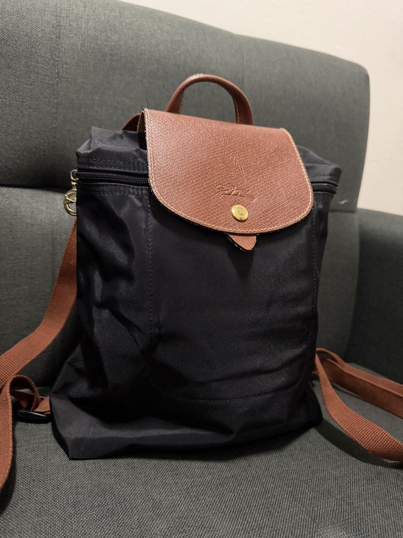 Longchamp Le Pliage Nylon Backpack Black Brown (Category: Backpacks) located in Manila. Submitted by ihshey (Listing ID 1466305840, Image 1). Description: 🖤 LONGCHAMP LE PLIAGE BACKPACK 🖤 A timeless everyday classic in Black with Brown Leather Trim 🤎 ✨ Model: L1699 089 001 ✨ Condition: 9/10 ✨ Gently used & well maintained ✨ Clean interior & exterior ✨ Purchased at 2nd STREET Japan 🇯🇵 ✨ Selling for ₱3,800� 📍 RFS: Decluttering / rarely used P