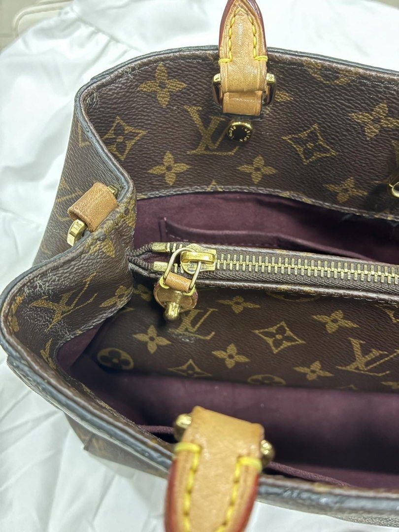 Louis Vuitton LV montagne (Category: Luxury Bags & Wallets) located in Pasay City. Submitted by iflyph (Listing ID 1466156206, Image 3). Description: - Authentic LV montagne - bag only -please see pics for flaws -scratches/fade here and there 7/10 condition guaranteed authentic or money back no return no exchange.