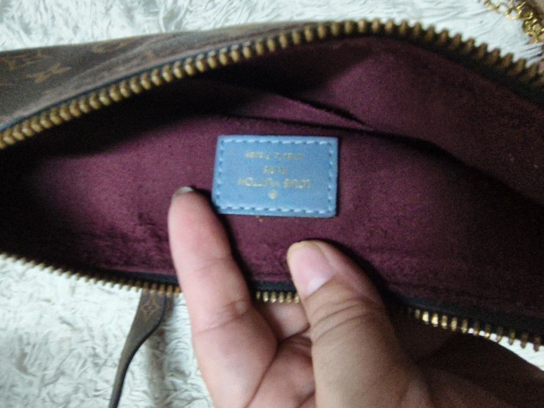 Louis Vuitton Monogram Canvas Shoulder Bag (Category: Luxury Bags & Wallets) located in Pasay City. Submitted by cory0223 (Listing ID 1466156017, Image 2). Description: - Brown monogram canvas shoulder bag - Includes monogram strap with gold-toned hardware - Burgundy interior lining with zip top closure - Blue leather brand tag with date code MI3119 - Spacious enough for daily essentials.