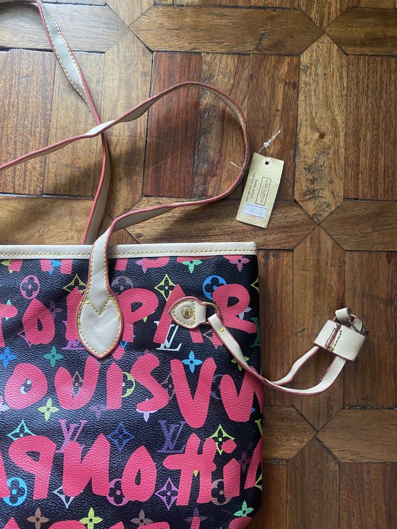Louis Vuitton Paris Multicolor Monogram Tote Bag (Category: Luxury Bags & Wallets) located in Manila. Submitted by anthony1723 (Listing ID 1466172482, Image 2). Description: - Brand: Louis Vuitton - Design: Vibrant pink Paris lettering and colorful monogram motifs on a black surface - Straps & Trim: Double shoulder straps with matching pink trim - Closure & Interior: Secure top zip closure, interior zip pocket, and classic LV-printed tan lining -