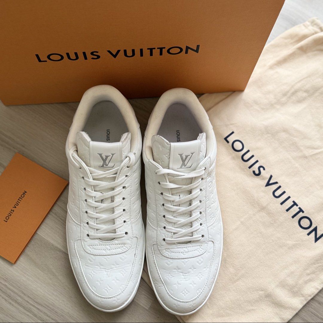 LOUIS VUITTON RIVOLI SNEAKER | WHITE MINI MONOGRAM | PRISTINE CONDITION (Category: Sneakers) located in Manila. Submitted by lessismore_9x (Listing ID 1466235238, Image 1). Description: LOUIS VUITTON RIVOLI SNEAKER | WHITE MINI MONOGRAM A refined Louis Vuitton Rivoli Sneaker in an elegant monochrome white colorway, featuring the signature Mini Monogram pattern embossed throughout the calf leather upper. The classic low-top silhouette, clean tonal