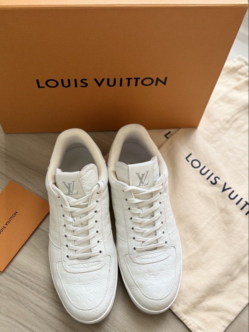 LOUIS VUITTON RIVOLI SNEAKER | WHITE MINI MONOGRAM | PRISTINE CONDITION (Category: Sneakers) located in Manila. Submitted by lessismore_9x (Listing ID 1466235238, Image 2). Description: LOUIS VUITTON RIVOLI SNEAKER | WHITE MINI MONOGRAM A refined Louis Vuitton Rivoli Sneaker in an elegant monochrome white colorway, featuring the signature Mini Monogram pattern embossed throughout the calf leather upper. The classic low-top silhouette, clean tonal