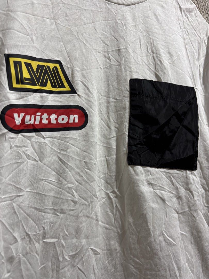 Louis Vuitton White T-Shirt Size M (Category: Tshirts & Polo Shirts ) located in Malungon. Submitted by markthriftedstuff2022 (Listing ID 1466331628, Image 2). Description: - Brand: Louis Vuitton - Size: Medium (Made in Italy) - Color: White with contrasting black chest pocket - Details: Racing-style patches on the front, adjustable drawstring hem, and classic crew neck - Condition: Pre-owned with yellowing around the collar area from previous we