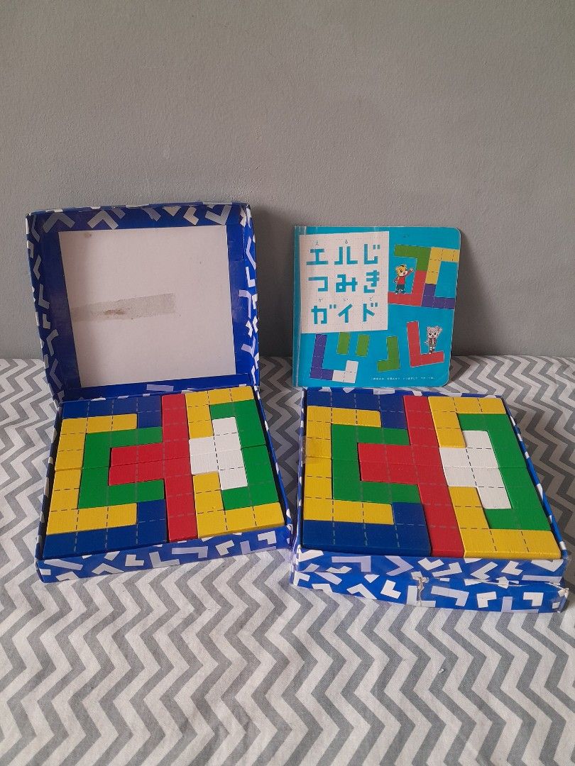 L-shaped Blocks (Category: Educational & Learning Toys) located in Pasig City. Submitted by three.babybears (Listing ID 1466247334, Image 1). Description: 2 sets of blocks plus 1 booklet.