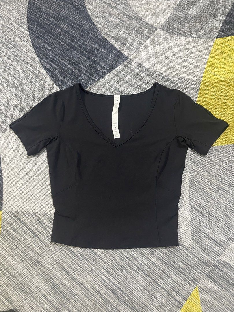Lululemon align t shirt (Category: Shirts) located in Taytay. Submitted by ekselentekondisyon (Listing ID 1466282621, Image 1). Description: Lululemon align t shirt V neck Excellent condition Malambot tela No issue Dot 4 on tag Taytay rizal location.