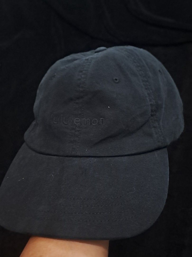 Lululemon Black Baseball Cap (Category: Caps & Hats) located in Puerto Princesa. Submitted by jercksthriftph (Listing ID 1466330211, Image 1). Description: - Brand: Lululemon - Style: Classic baseball cap - Color: Black (Cotton Blend) - Size: S/M - Details: Subtle tonal side embroidery and adjustable back strap with silver metal buckle - Condition: Excellent, clean interior sweatband - Ripe for daily wear, gym sessions, or running errands.