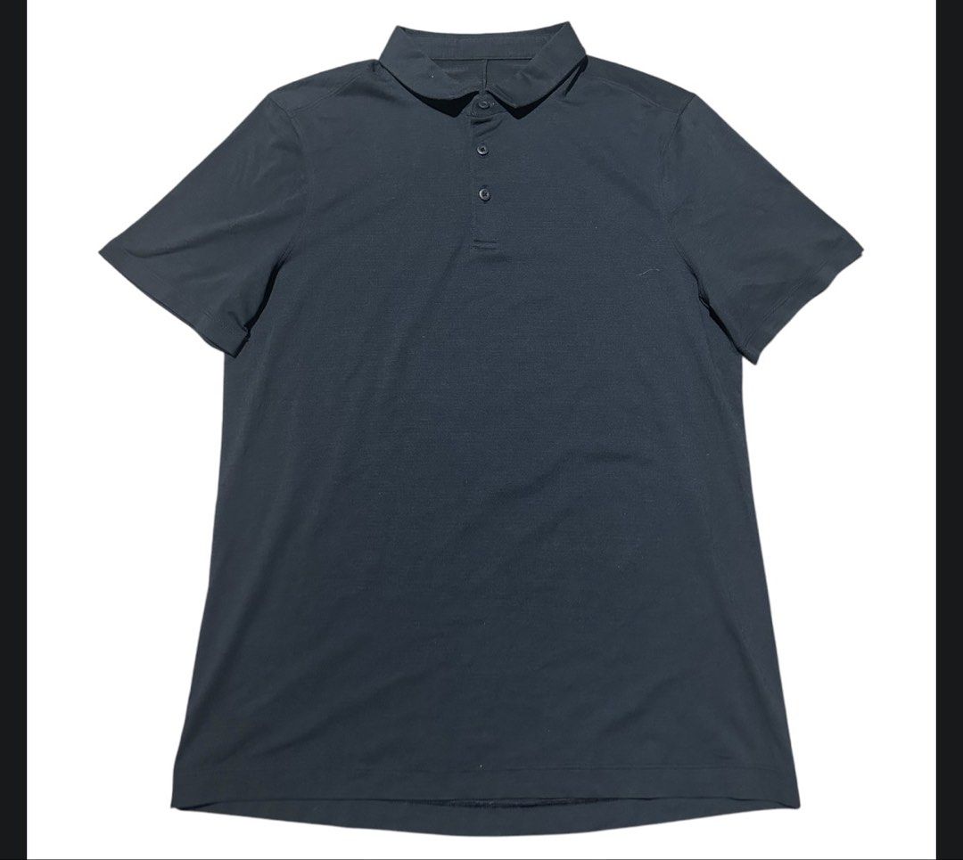 Lululemon Evolution Short-Sleeve Polo Shirt size xs (Category: Activewear) located in Iba. Submitted by xooperfindslb (Listing ID 1466190356, Image 2). Description: Lululemon Evolution Short-Sleeve Polo Shirt Size xs Armpit to armpit 19 1/2 inches when laid flat Color: true navy Excellent condition No issue.