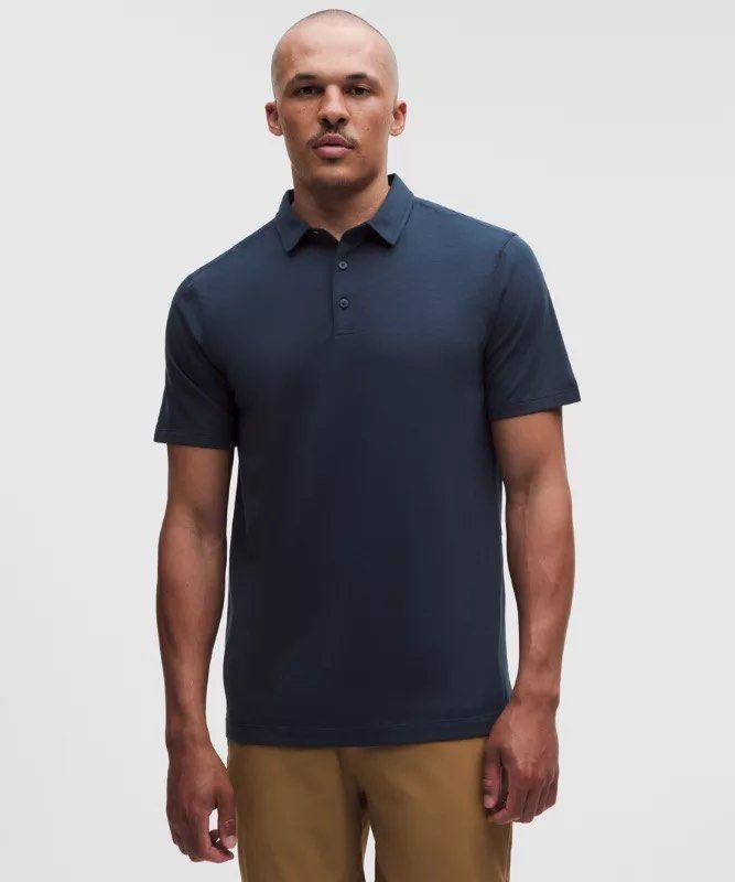 Lululemon Evolution Short-Sleeve Polo Shirt size xs (Category: Activewear) located in Iba. Submitted by xooperfindslb (Listing ID 1466190356, Image 1). Description: Lululemon Evolution Short-Sleeve Polo Shirt Size xs Armpit to armpit 19 1/2 inches when laid flat Color: true navy Excellent condition No issue.