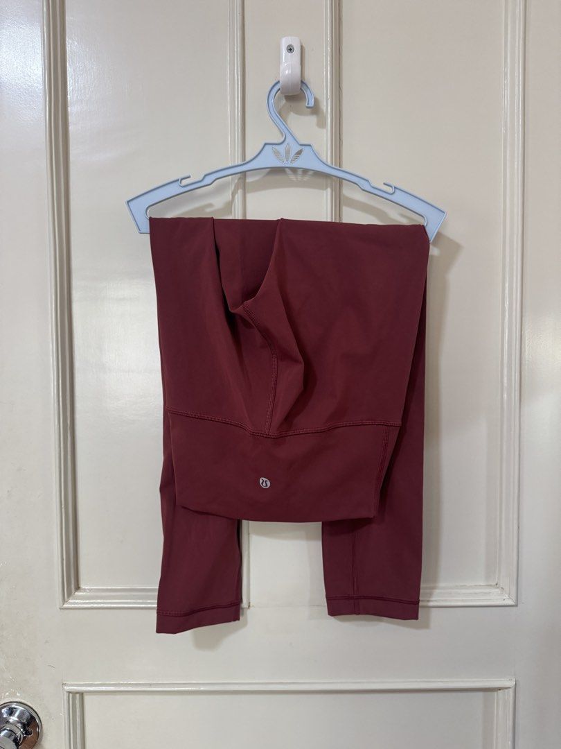 Lululemon Maroon Leggings Size 2 (Category: Activewear) located in Davao. Submitted by thrsedeclutter (Listing ID 1466185716, Image 1). Description: - Brand: Lululemon - Style: High-waist leggings with classic logo on back waistband - Color: Rich maroon - Size: 2 - Material: 69% nylon, 31% lycra elastane (buttery soft feel) - Condition: Clean inside and out, well-maintained from a smoke-free wardrobe.