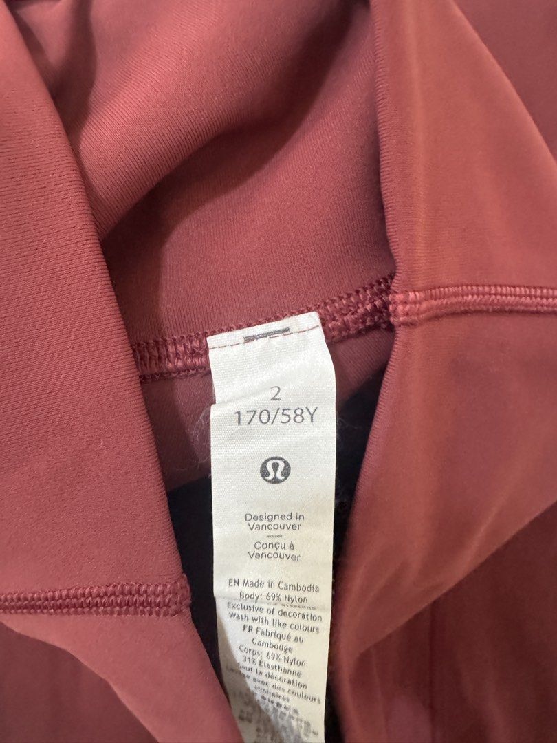 Lululemon Maroon Leggings Size 2 (Category: Activewear) located in Davao. Submitted by thrsedeclutter (Listing ID 1466185716, Image 3). Description: - Brand: Lululemon - Style: High-waist leggings with classic logo on back waistband - Color: Rich maroon - Size: 2 - Material: 69% nylon, 31% lycra elastane (buttery soft feel) - Condition: Clean inside and out, well-maintained from a smoke-free wardrobe.