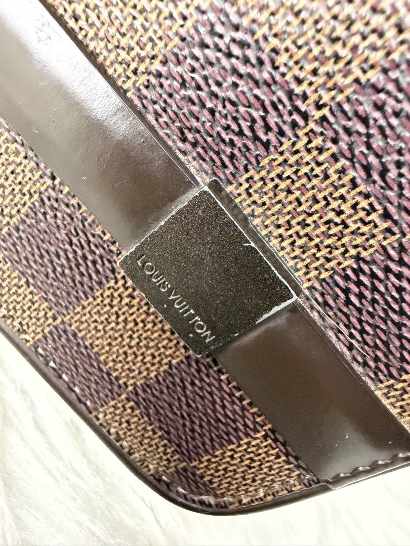 LV Damier Ebene (Category: Shoulder Bags) located in Bacolod City. Submitted by sh33natole.07 (Listing ID 1466178622, Image 2). Description: Exterior: Corner wear,scuffs,edge wear surface wear Hardware: Scratch(es) Interior: Scuffs, surface wear Handle:Resin glazing , no tear on the handle just signs of use. Overall in good condition 💯 Authentic 📍Shop Policies: - All bags are preloved - Buyers are encouraged to review all photos and details car