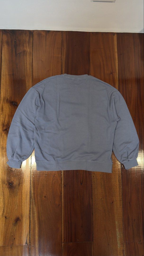 Magenta Seoul Sweatshirt (Category: Coats, Jackets and Outerwear) located in Manila. Submitted by royalgem-3655 (Listing ID 1466271833, Image 2). Description: - Brand/Source: Bought in Korea - Color/Design: Magenta blue with embroidered dog graphic - Material: Super cozy fabric - Fit: Relaxed, oversized crewneck - Details: Ribbed cuffs and hem - Condition: Barely worn - Styling: Perfect with jeans or sweatpants for a lazy day outfit.