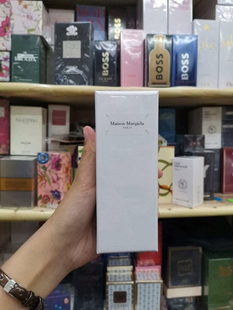 Maison Margiela EDP 100ml (Category: Fragrance & Deodorants) located in Manila. Submitted by e-tindahan (Listing ID 1466330274, Image 1). Description: Warning: baka mapa-add to cart ka after nito. 👀💸 If you want to smell expensive, classy, and mabango all day without paying the OG price, this is for you. 🤍 Perfect din if you want to build your perfume collection without breaking the bank. Kaya kung matagal mo nang gusto i-try yung scent, eto n
