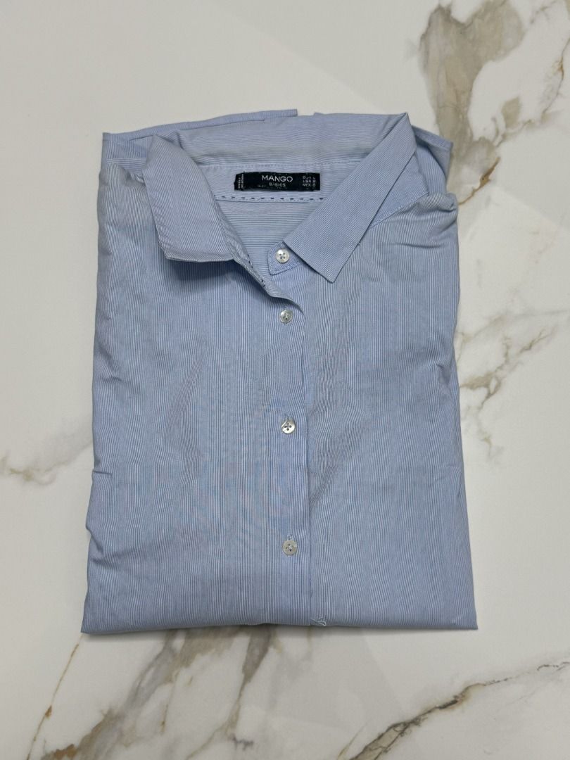 MANGO Blue Stripes Blouse in Large (Category: Shirts) located in Marikina City. Submitted by tashdeclutters. (Listing ID 1466215649, Image 3). Description: ✨ MANGO Blue Stripes Blouse in Large - P690 ✨ Condition3: Good/Lightly Used 🛍️ Purchased in: Philippines ✨ @tashdeclutters ✨ Created to share the things that no longer spark joy with Tash — and hopefully, let them spark joy for someone else. 🤍 📌 SHOP POLICIES • Prices posted are FINAL. • NO