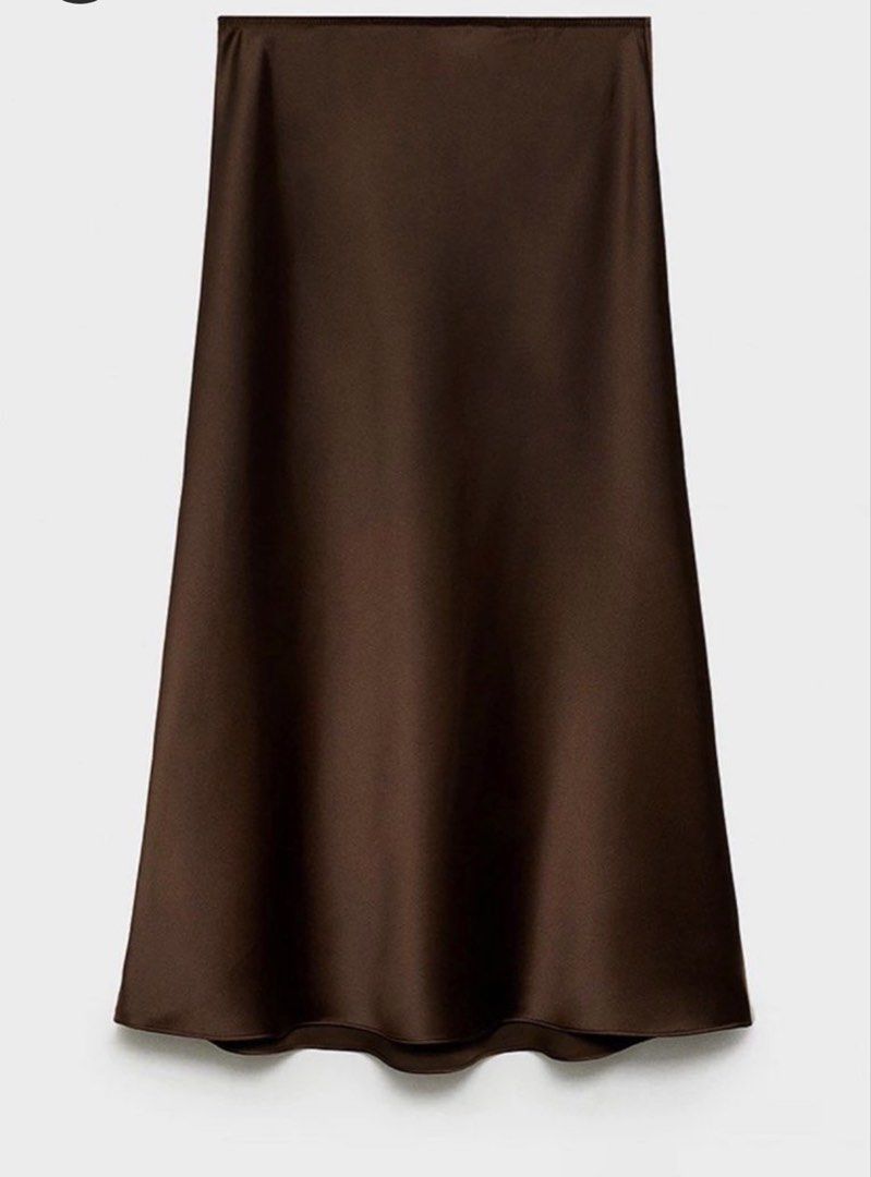 Mango Brown Satin Midi Skirt (Category: Skirts) located in Manila. Submitted by joan.here (Listing ID 1466164368, Image 3). Description: Brand: mango Size: xs Condition: Minor loose threads near the inner waistband seam (see photo) but not visible on the outside Delivery: grab or lalamove. Del fee shouldered by buyer Mop: bank transfer Loc: tondo manila.