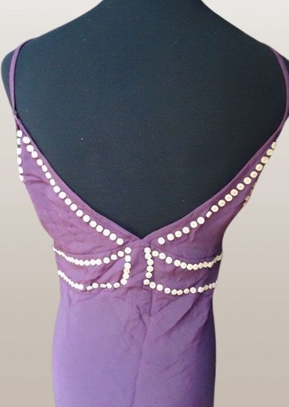 MANGO VIOLET PLUM BUTTON DRESS (Category: Evening dresses & gowns) located in Marikina City. Submitted by minimalistmanila (Listing ID 1464504391, Image 2). Description: New with tags Mango violet plum button dress. Medium fit: 18 inches bust, 42 inches length. Unique style. Bought in Mango Singapore for P5,500 if converted. Order now! .