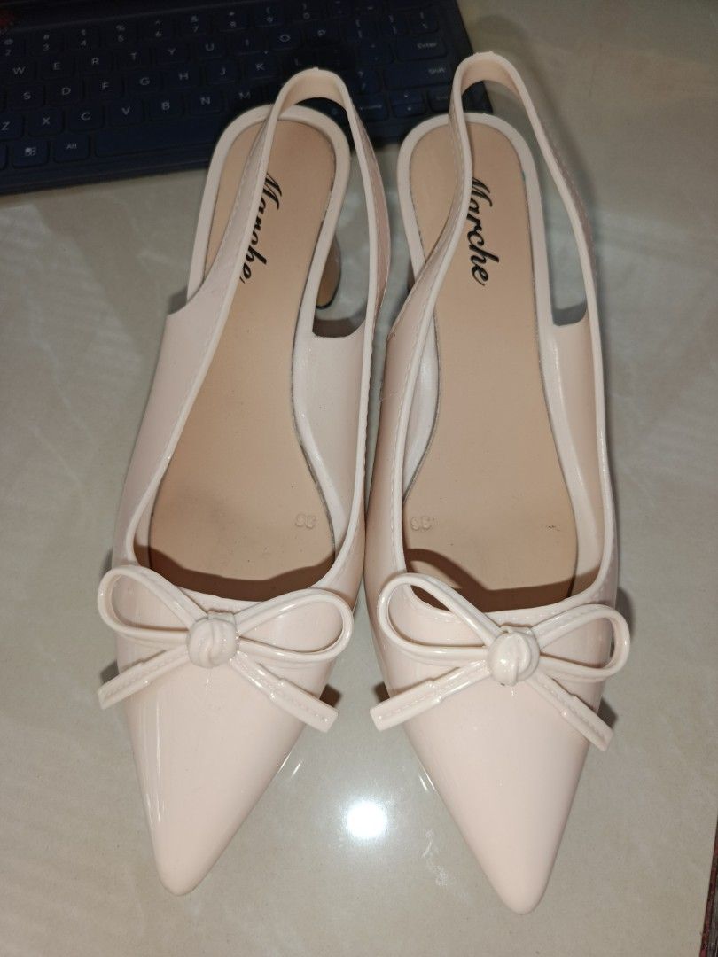 Marche Pointed Slingback Block Heels (Category: Heels) located in Cavite. Submitted by mrsesaleshop (Listing ID 1466259474, Image 3). Description: Selling this gorgeous pair of nude/beige slingback heels! Super classy French-style design with a cute bow detail and comfortable block heels—perfect for the office, dates, or events. Brand: Marche Size: 36 fit size 34-35 Color: Nude / Glossy Beige Condition: Preloved, excellent condition PM for price 
