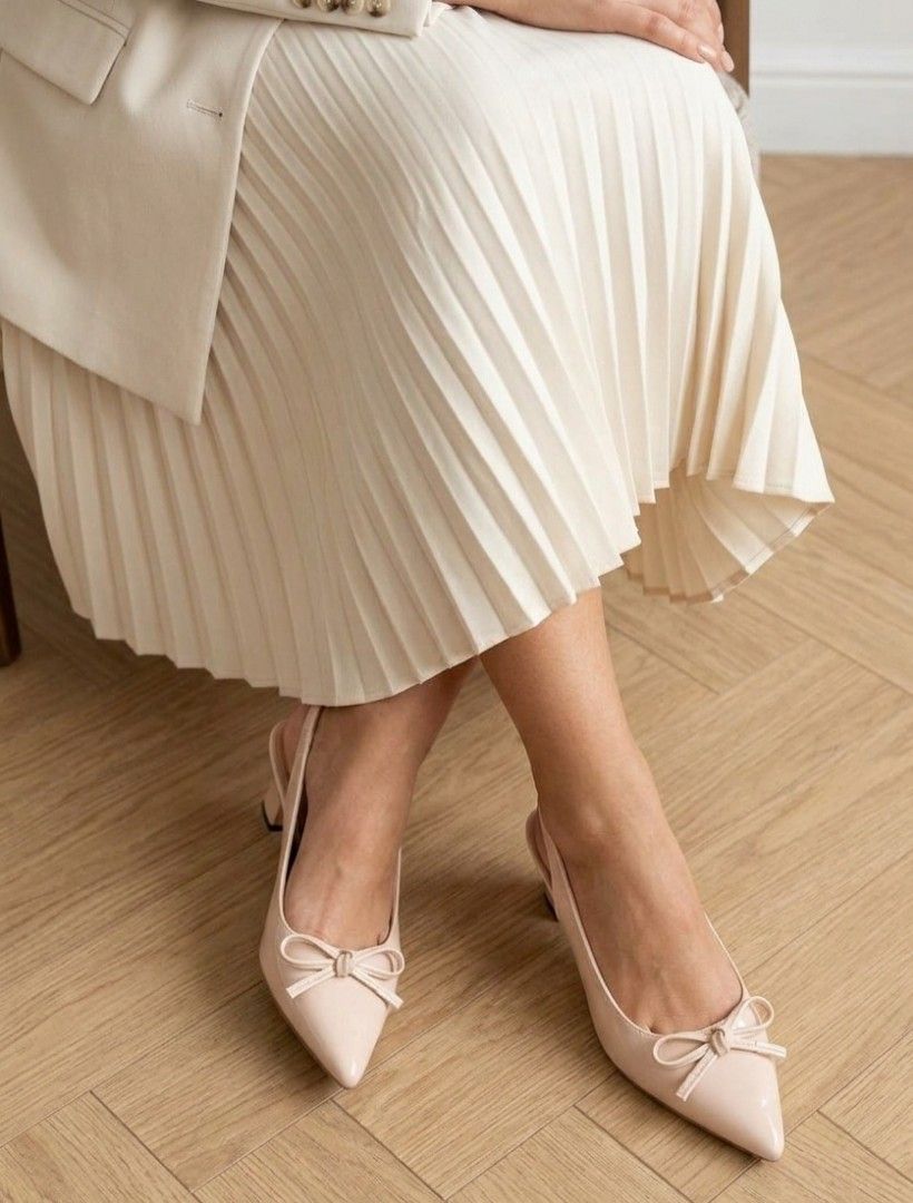 Marche Pointed Slingback Block Heels (Category: Heels) located in Cavite. Submitted by mrsesaleshop (Listing ID 1466259474, Image 1). Description: Selling this gorgeous pair of nude/beige slingback heels! Super classy French-style design with a cute bow detail and comfortable block heels—perfect for the office, dates, or events. Brand: Marche Size: 36 fit size 34-35 Color: Nude / Glossy Beige Condition: Preloved, excellent condition PM for price 