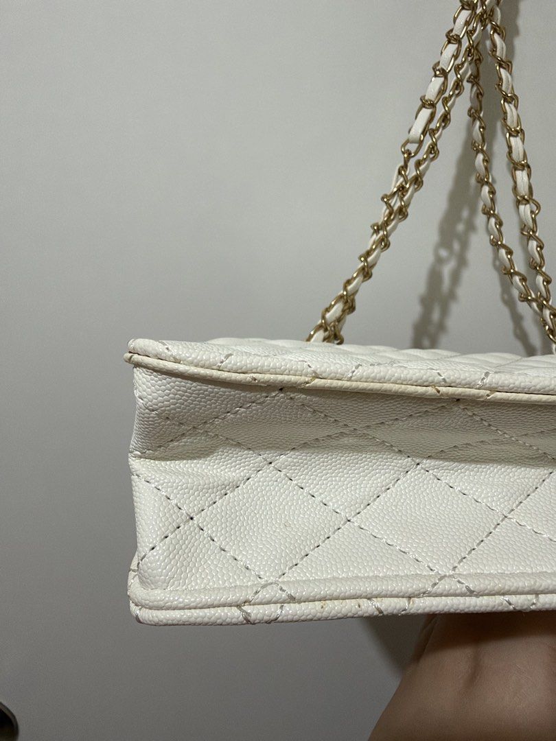 Marikina White Quilted Shoulder Bag with Chain Strap (Category: Shoulder Bags) located in Manila. Submitted by gbrlldeclutters (Listing ID 1466287366, Image 3). Description: please manage your expectations, as this is a preloved item. • marikina white quilted shoulder bag w chain strap • used only a few times • in good preloved condition — yellowing on the sides due to storage but can be cleaned. no peeling • swipe through the photos for a closer