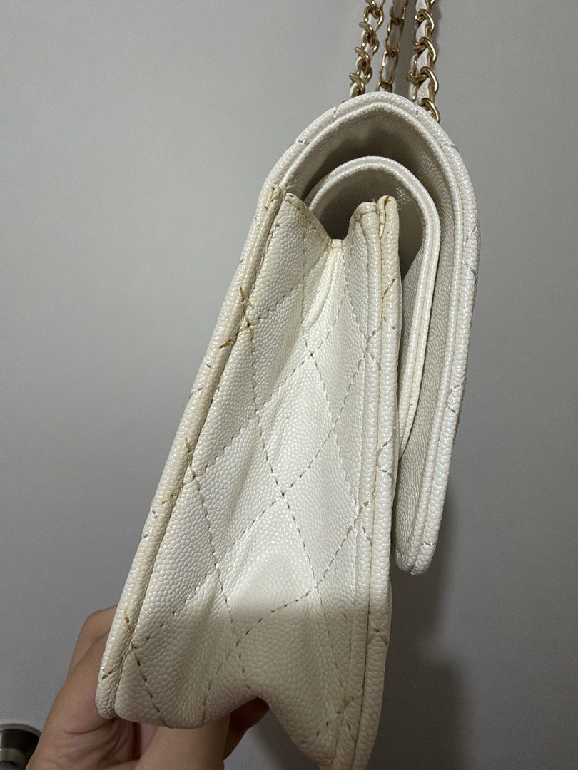 Marikina White Quilted Shoulder Bag with Chain Strap (Category: Shoulder Bags) located in Manila. Submitted by gbrlldeclutters (Listing ID 1466287366, Image 2). Description: please manage your expectations, as this is a preloved item. • marikina white quilted shoulder bag w chain strap • used only a few times • in good preloved condition — yellowing on the sides due to storage but can be cleaned. no peeling • swipe through the photos for a closer