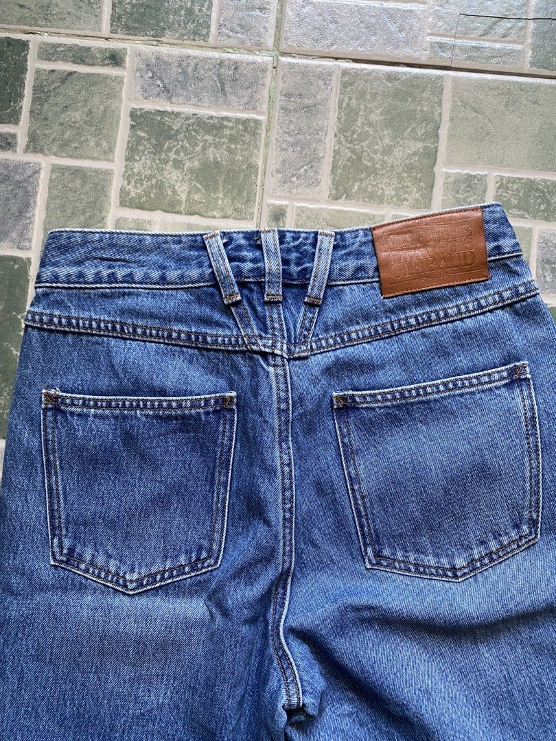 Marithe Francois Girbaud Denim Jeans Size 26 (Category: Jeans) located in Cotabato. Submitted by thewalfinds.ph (Listing ID 1466183171, Image 2). Description: Marithe Francois Girbaud blue denim jeans. Size 26 tag inside. High-waisted cut with unique angled yoke seams on front and back. Brown leather brand patch on back waistband. Metal button closure and zipper fly. Standard five-pocket setup with deep back pockets. Classic straight leg silhouet