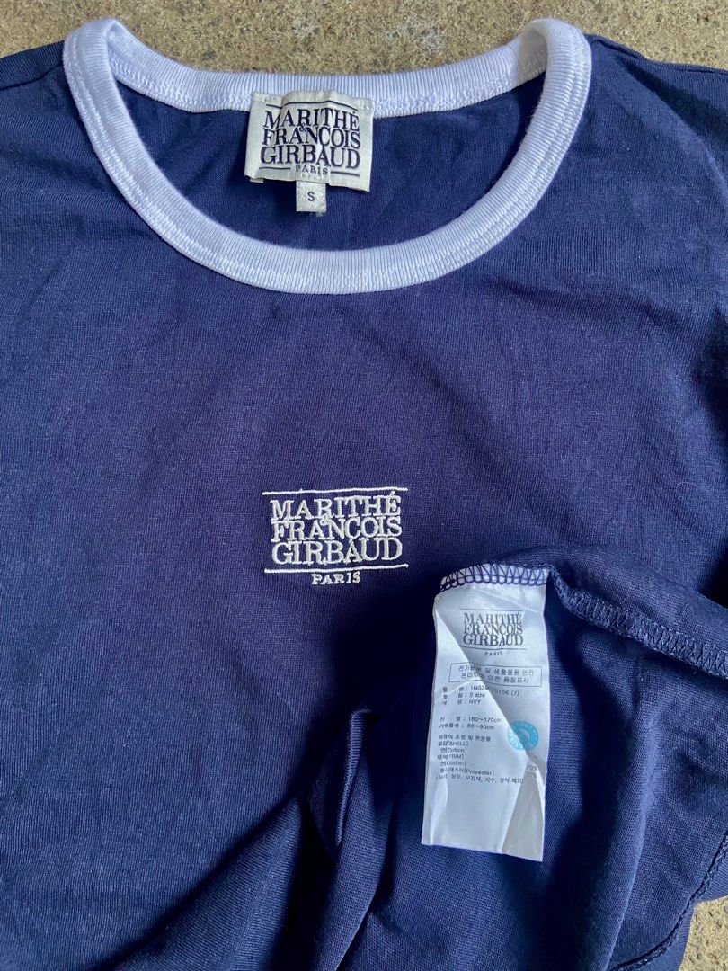 Marithe Francois Girbaud Navy Ringer T-Shirt Size S (Category: Tshirts & Polo Shirts ) located in Polomolok. Submitted by tnecniv311 (Listing ID 1466276906, Image 3). Description: - Brand: Marithe Francois Girbaud - Style: Ringer t-shirt with contrast white ribbed collar and sleeve cuffs - Color: Dark navy blue with white embroidered chest logo - Size: Tag size Small - Material: Comfortable cotton blend - Condition: Clean inside and out, labels f