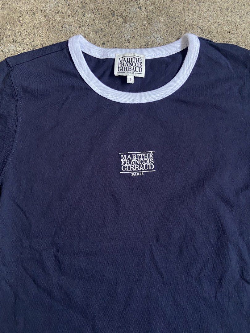Marithe Francois Girbaud Navy Ringer T-Shirt Size S (Category: Tshirts & Polo Shirts ) located in Polomolok. Submitted by tnecniv311 (Listing ID 1466276906, Image 2). Description: - Brand: Marithe Francois Girbaud - Style: Ringer t-shirt with contrast white ribbed collar and sleeve cuffs - Color: Dark navy blue with white embroidered chest logo - Size: Tag size Small - Material: Comfortable cotton blend - Condition: Clean inside and out, labels f