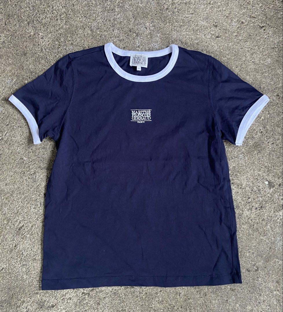 Marithe Francois Girbaud Navy Ringer T-Shirt Size S (Category: Tshirts & Polo Shirts ) located in Polomolok. Submitted by tnecniv311 (Listing ID 1466276906, Image 1). Description: - Brand: Marithe Francois Girbaud - Style: Ringer t-shirt with contrast white ribbed collar and sleeve cuffs - Color: Dark navy blue with white embroidered chest logo - Size: Tag size Small - Material: Comfortable cotton blend - Condition: Clean inside and out, labels f