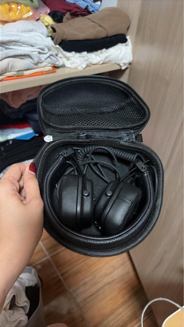 Marshall IV Headphones with Case (Category: Headphones & Headsets) located in Pasay City. Submitted by nandope (Listing ID 1466235110, Image 2). Description: - Brand: Marshall IV Headphones - Color: Classic black with iconic white script logo - Comfort: Padded headband and plush ear cushions for all-day listening - Design: Foldable build with durable metal hinges for easy travel - Connectivity: Wired setup featuring a flexible coiled audio cable 