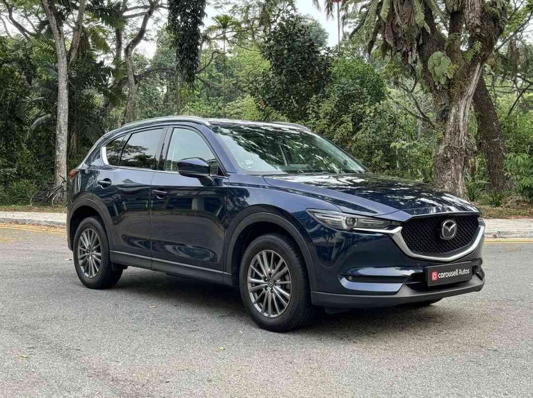 Mazda CX-5 2.0 Premium (A) (Category: Used Cars) located in Singapore. Submitted by carousellcars (Listing ID 1466223197, Image 3). Description: This unit is owned by Carousell Certified Cars, managed by Carousell Autos. Reliable and quality Certified Cars: ☑ ︎ 119-points inspected ☑ ︎ 6-month engine & gearbox warranty ☑ ︎ Dedicated support ☑ ︎ Fully assisted and fuss-free with paperwork support We pride ourselves on offering some of the most com