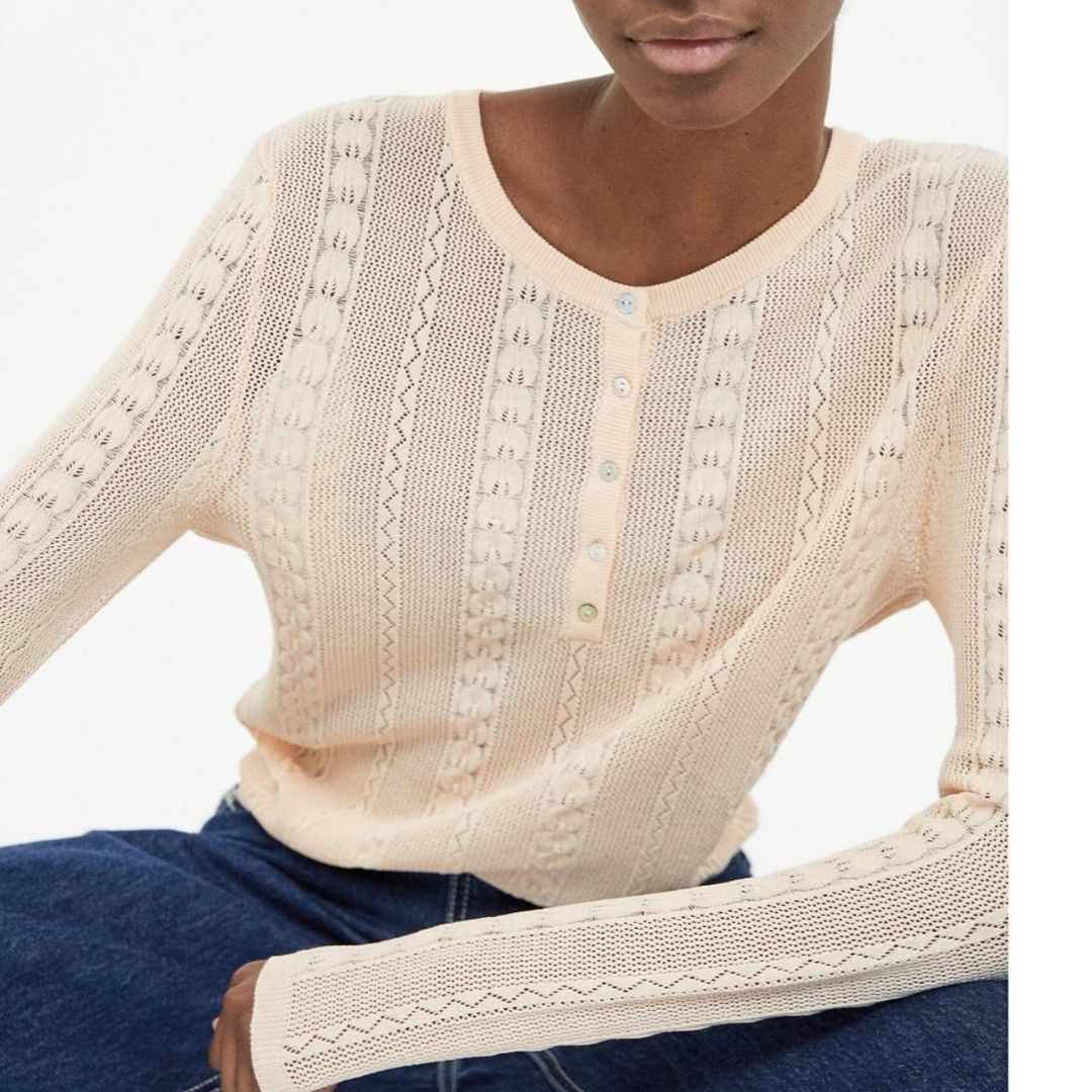 Medium - Zara Open Knit Cardigan (Category: Others Tops) located in Castillejos. Submitted by lalainecloset22 (Listing ID 1466180056, Image 1). Description: - Brand: Zara - Size: Medium (EUR M / USA M) - Color: Soft Cream / Nude Peach - Material: Breathable open-knit fabric with delicate cable knit patterns - Features: Round neckline, long sleeves, and dainty mother-of-pearl style front buttons - Condition: Excellent pre-loved condition - Perfect
