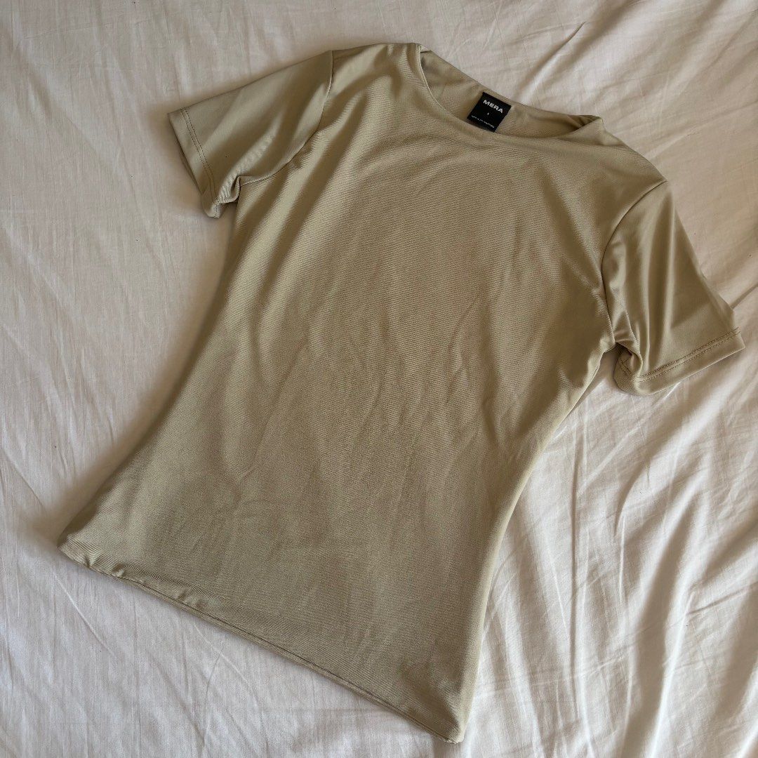Mera Double Lining Khaki Fitted Top (Category: Shirts) located in Binan City. Submitted by myprelovedhaul (Listing ID 1466249481, Image 1). Description: - fits xs to small! - no when worn photos! - last price posted! - please message only if sure buyer! - limited replies only. - Available unless mark as sold. - Ship via j&t or lalamove for same day. -Mode of payment: Gcash 📍Biñan Laguna .